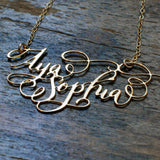 Custom Calligraphy Two Name Necklace - Your Loved Ones Names Handwritten By A Calligrapher - High Quality, Affordable, One-of-a-kind, Personalized Necklace - Available in Gold and Silver - Made in USA - Brevity Jewelry - The Pefect Gift