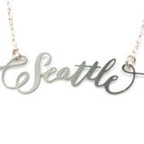 Seattle City Love Necklace - High Quality, Hand Lettered, Calligraphy City Necklace - Your Favorite City - Available in Gold and Silver - Made in USA - Brevity Jewelry