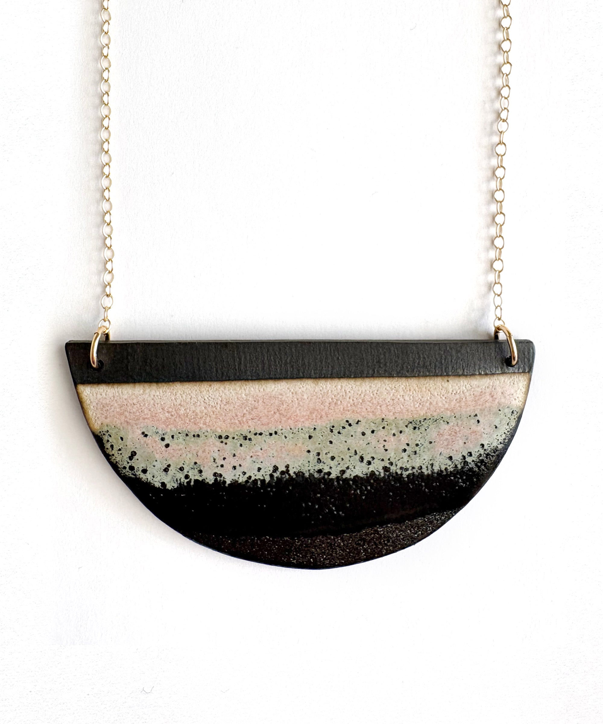 Brevity one-of-a-kind ceramic pendant necklace, half-moon glazed in pink and mint, on a fine chain
