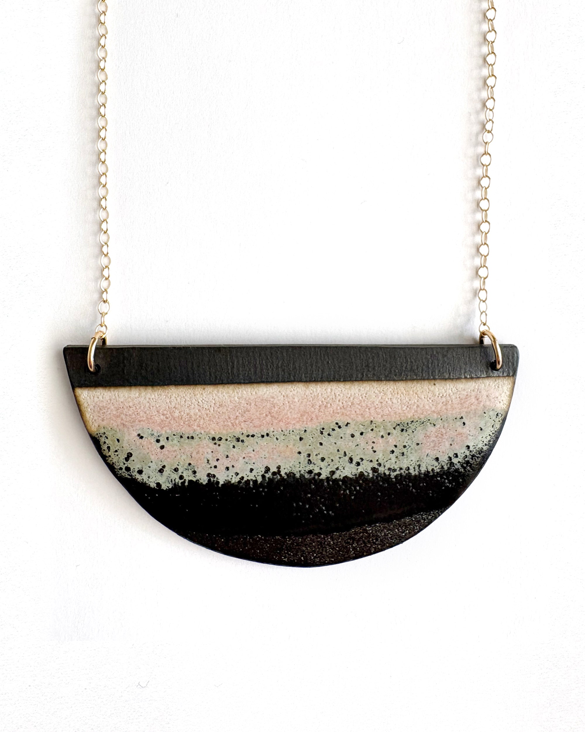 Brevity one-of-a-kind ceramic pendant necklace, half-moon glazed in pink and mint, on a fine chain