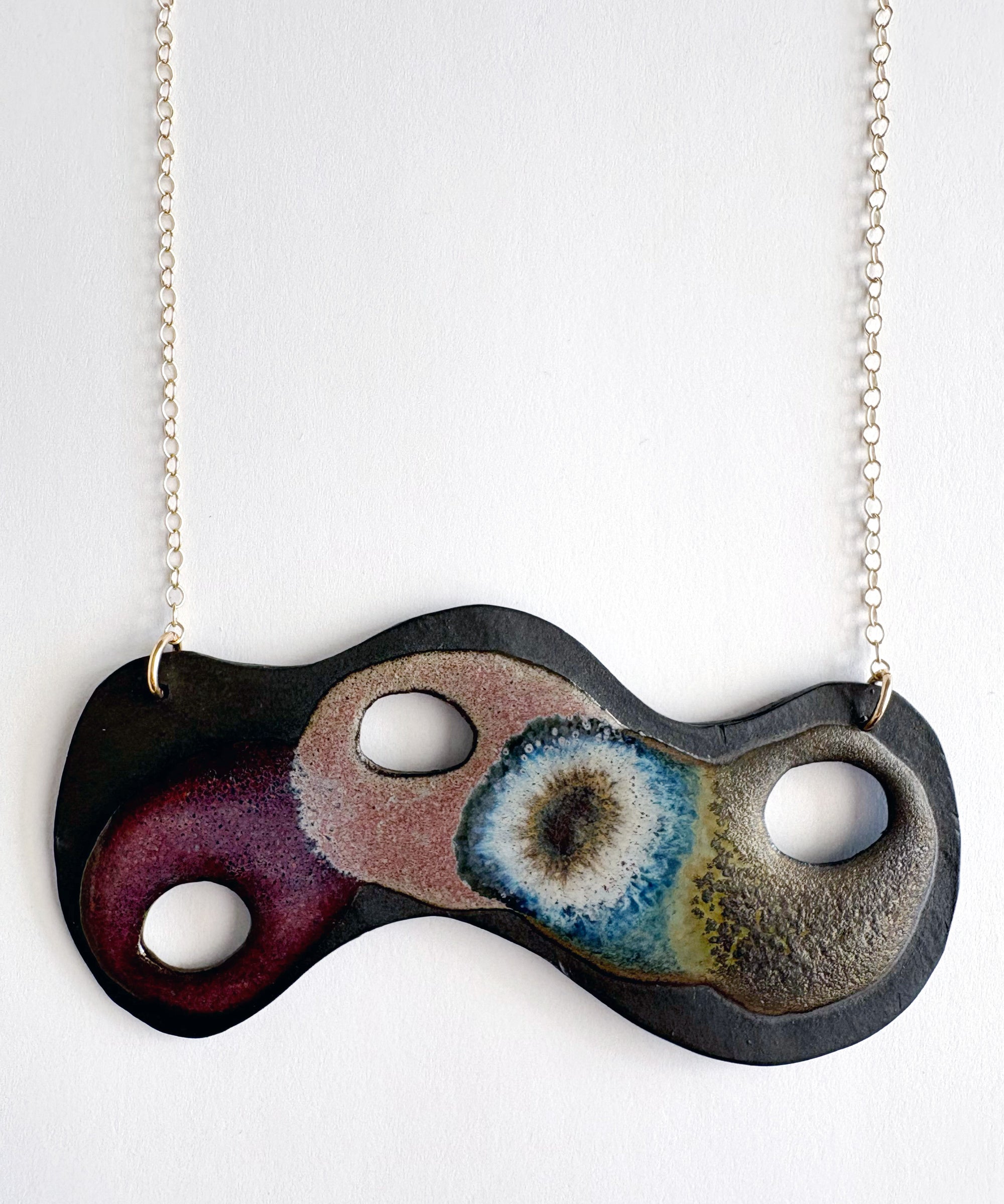 Brevity one-of-a-kind ceramic pendant necklace, freeform glazed in crimson, purple and teal, on a fine chain
