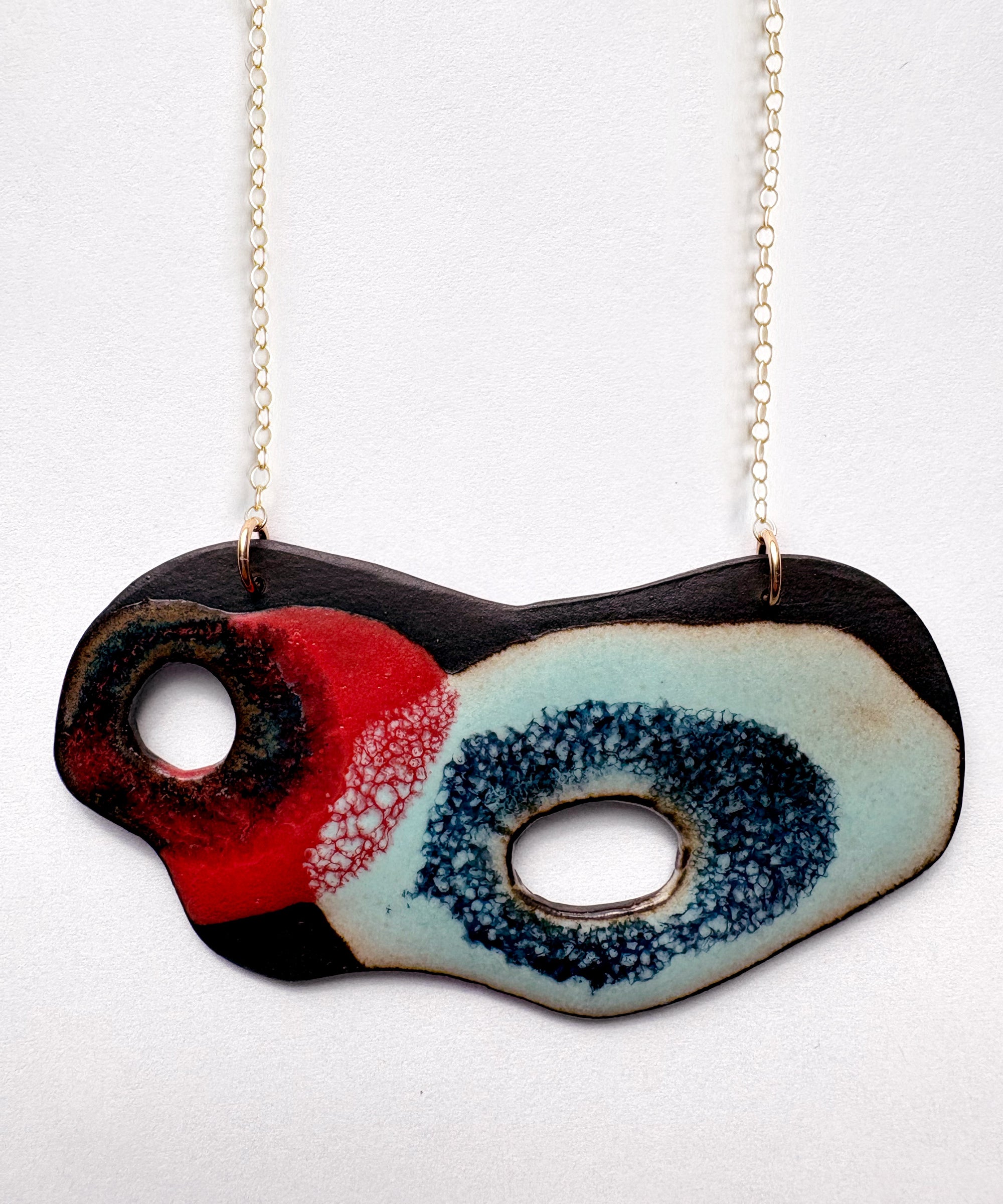 Brevity one-of-a-kind ceramic pendant necklace, freeform glazed in scarlet, navy and teal, on a fine chain