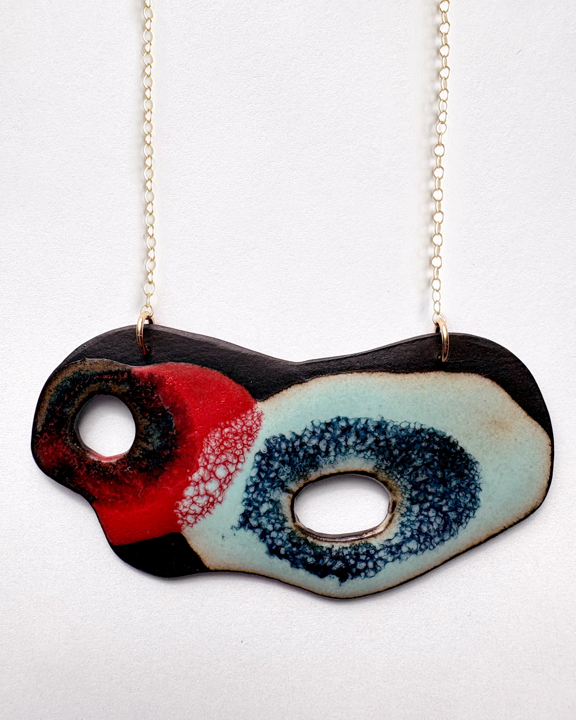 Brevity one-of-a-kind ceramic pendant necklace, freeform glazed in scarlet, navy and teal, on a fine chain