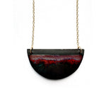 Brevity one-of-a-kind ceramic pendant necklace, half-moon glazed in deep red and a matte metal, on a fine chain