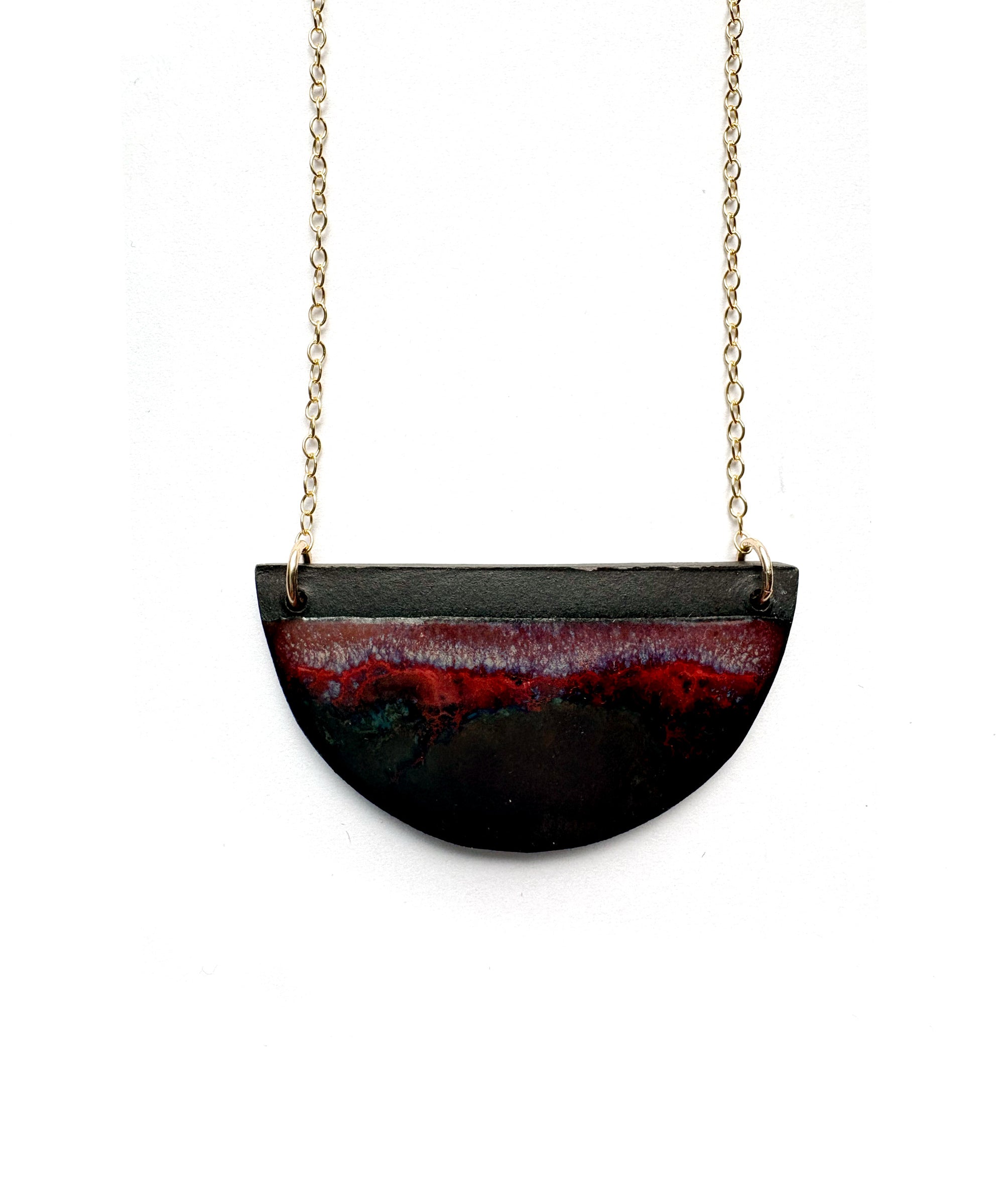 Brevity one-of-a-kind ceramic pendant necklace, half-moon glazed in deep red and a matte metal, on a fine chain