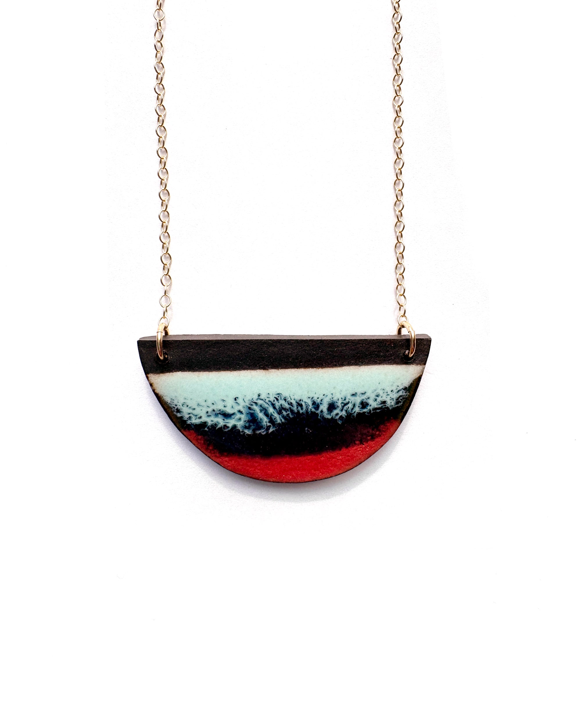 Brevity one-of-a-kind ceramic pendant necklace, half-moon glazed in seafoam blue and deep red, on a fine chain