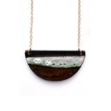 Brevity one-of-a-kind ceramic pendant necklace, half-moon glazed in white and bronze, on a fine chain