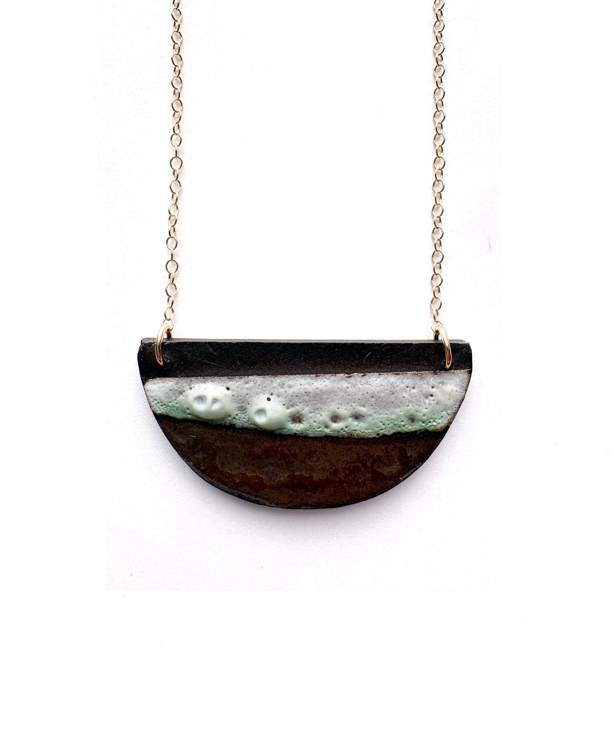 Brevity one-of-a-kind ceramic pendant necklace, half-moon glazed in white and bronze, on a fine chain