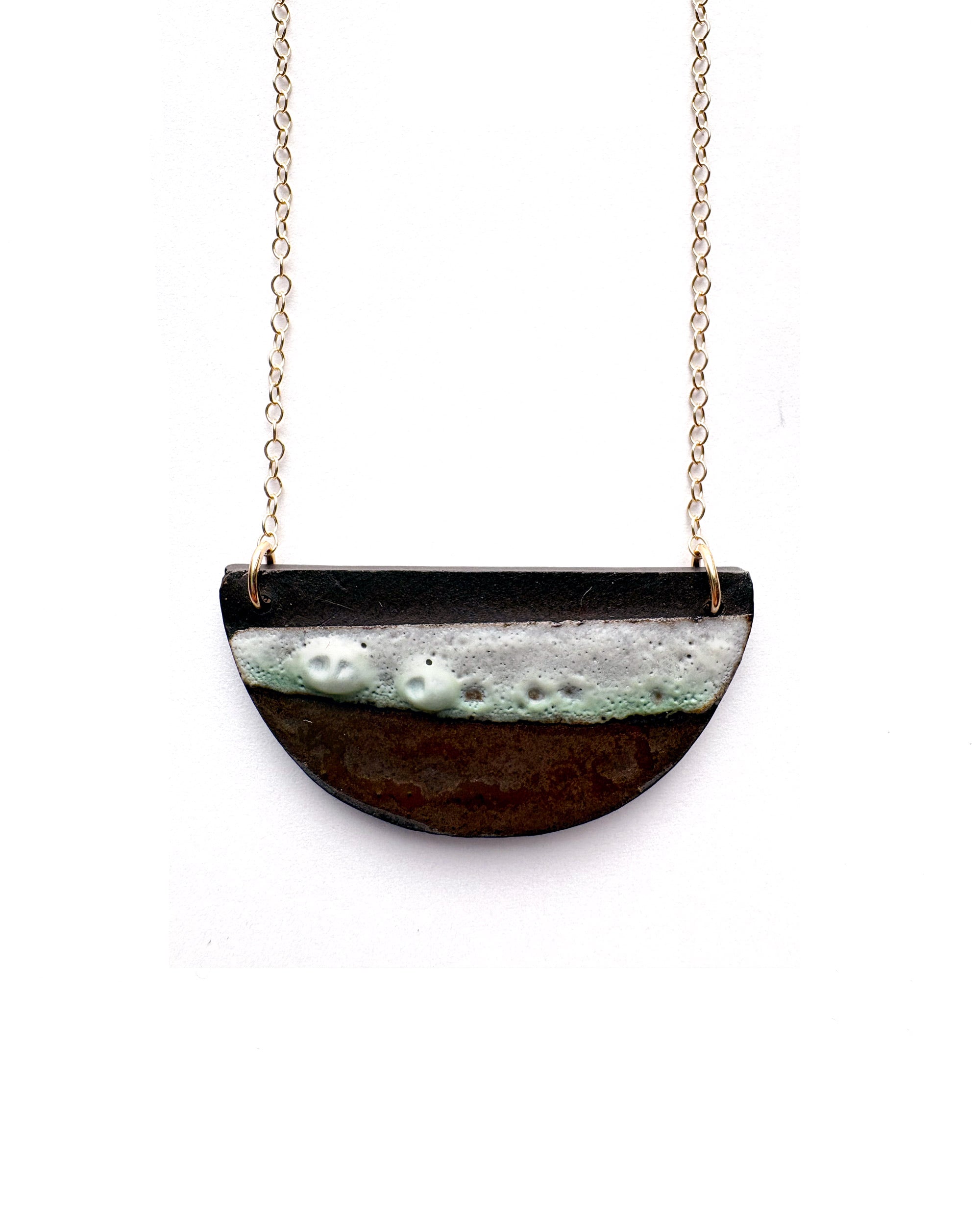 Brevity one-of-a-kind ceramic pendant necklace, half-moon glazed in white and bronze, on a fine chain
